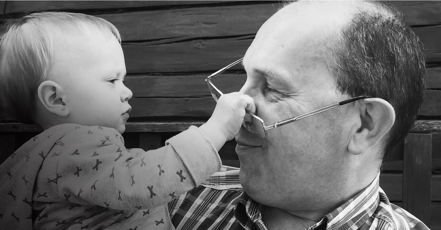 man holding a baby